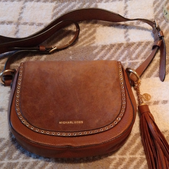 Michael Kors Handbags - Michael Kors Brown Leather Studded Saddle Crossbody with Tassel